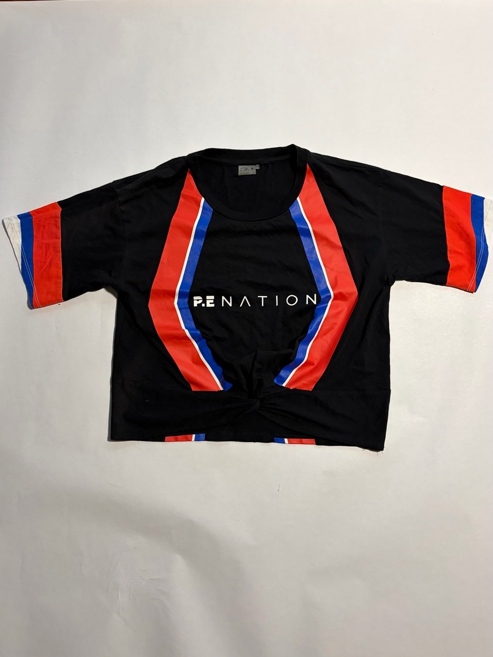 P.E Nation Black Crop Tee with Red & Blue Stripe Accents